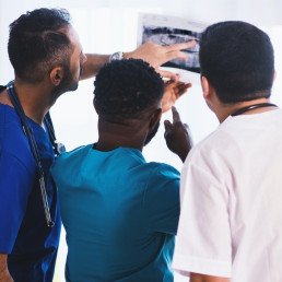 group of doctors looking at lab results
